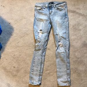 Distressed light wash jeans